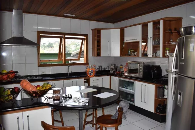 Imagem Casa com 3 dormitórios à venda, 285 m² por R$ 1.250.000,00 - Jardim Toriba - Campos do Jordão/SP