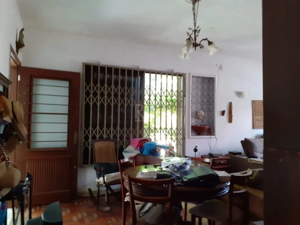 Imagem Casa para Venda - 120m², 3 dormitórios, 1 vaga - Santa Tereza