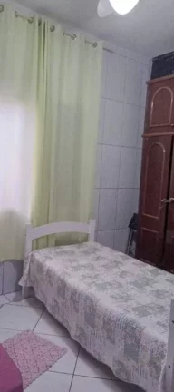 Imagem Casa com 2 dormitórios à venda por R$ 650.000 - Ocian - Praia Grande/SP