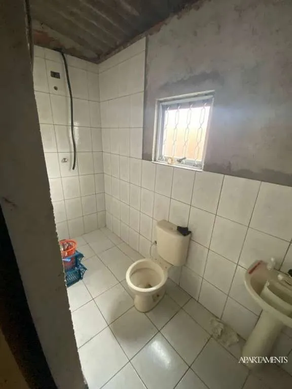 Imagem Terreno com 3 Casas com 3 vagas de carro e moto.