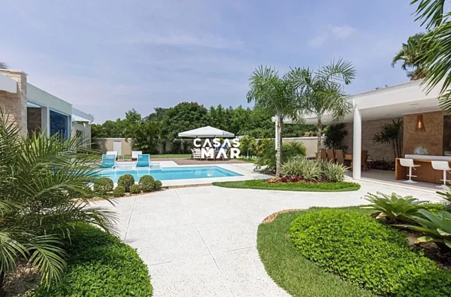 Imagem Imponente mansão de luxo na Barra da Tijúca: 5 quartos, 4 suítes, 3 salas, 7 banheiros, 2 vagas de garagem, 920m² de área. Venda!
