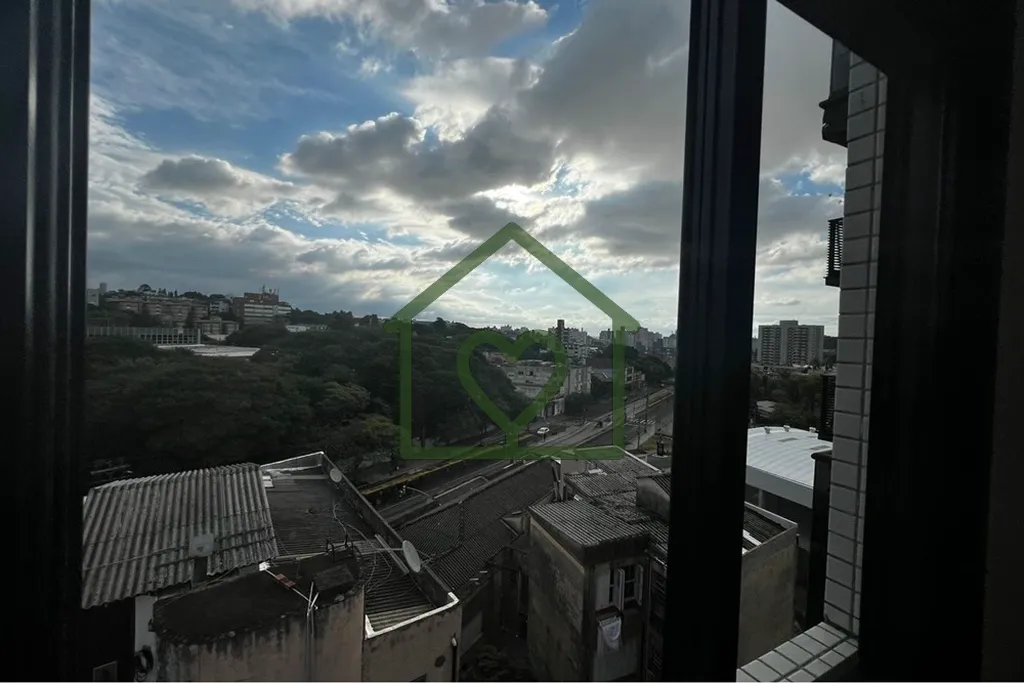 Imagem Descubra o charme e a conveniência deste aconchegante apartamento situado no coração de Porto Ale...