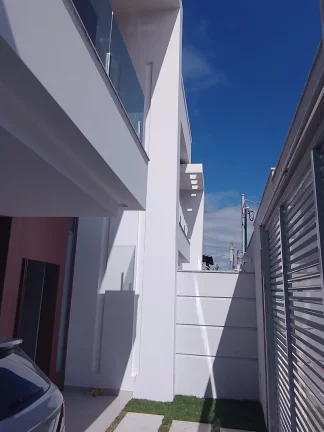 Imagem Casa a venda na praia do Morro Guarapari-ES Casa duplex composta por 3 suítes sendo uma Suite master com Closet e 2 vagas de garagem