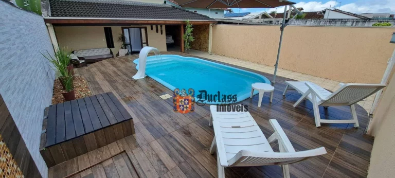 Imagem Sobrado com 4 dormitórios à venda, 246 m² por R$ 1.000.000,00 - Jardim Aruan - Caraguatatuba/SP