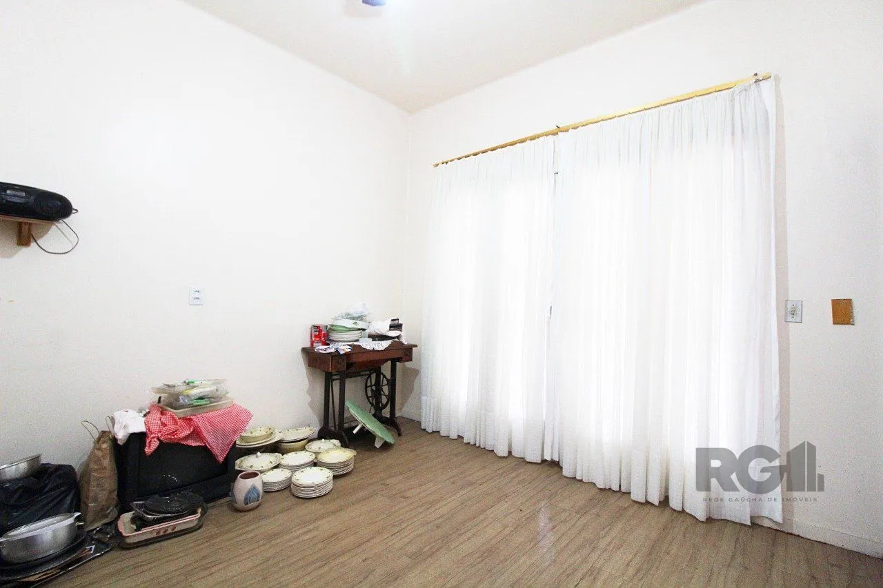 Imagem Casa à venda 4 quartos (dormitórios), suíte, 3 vagas - Partenon, Porto Alegre