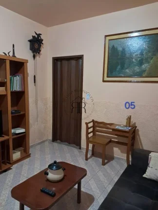 Imagem Sobrado com dois dormitórios sendo um suíte, área gourmet, sala e cozinha grandes, móveis planej...