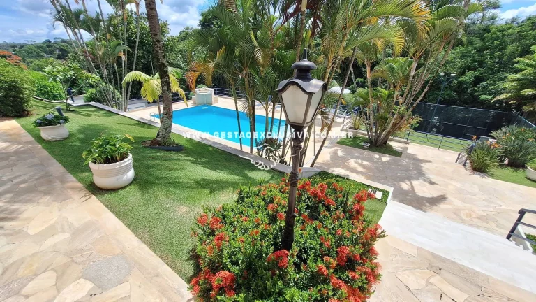Imagem CASA LUXUOSA 4 SUÍTES PISCINA ÁREA GOURMET COMPLETA EM CONDOMÍNIO FECHADO