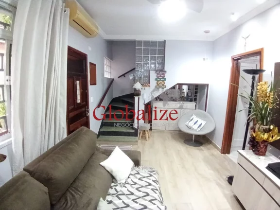 Imagem Casa em Vila à venda com 2 quartos, 2 banheiros, churrasqueira na Vila Mathias em Santos por R$426.000,00