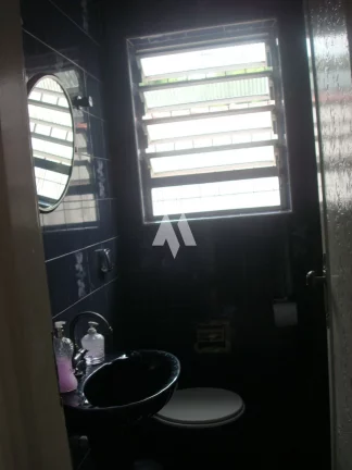 Imagem Casa à Venda no Centro de São Vicente– 307,73m², 4 Quartos, 1 Suíte, 4 Banheiros e Área de Festas