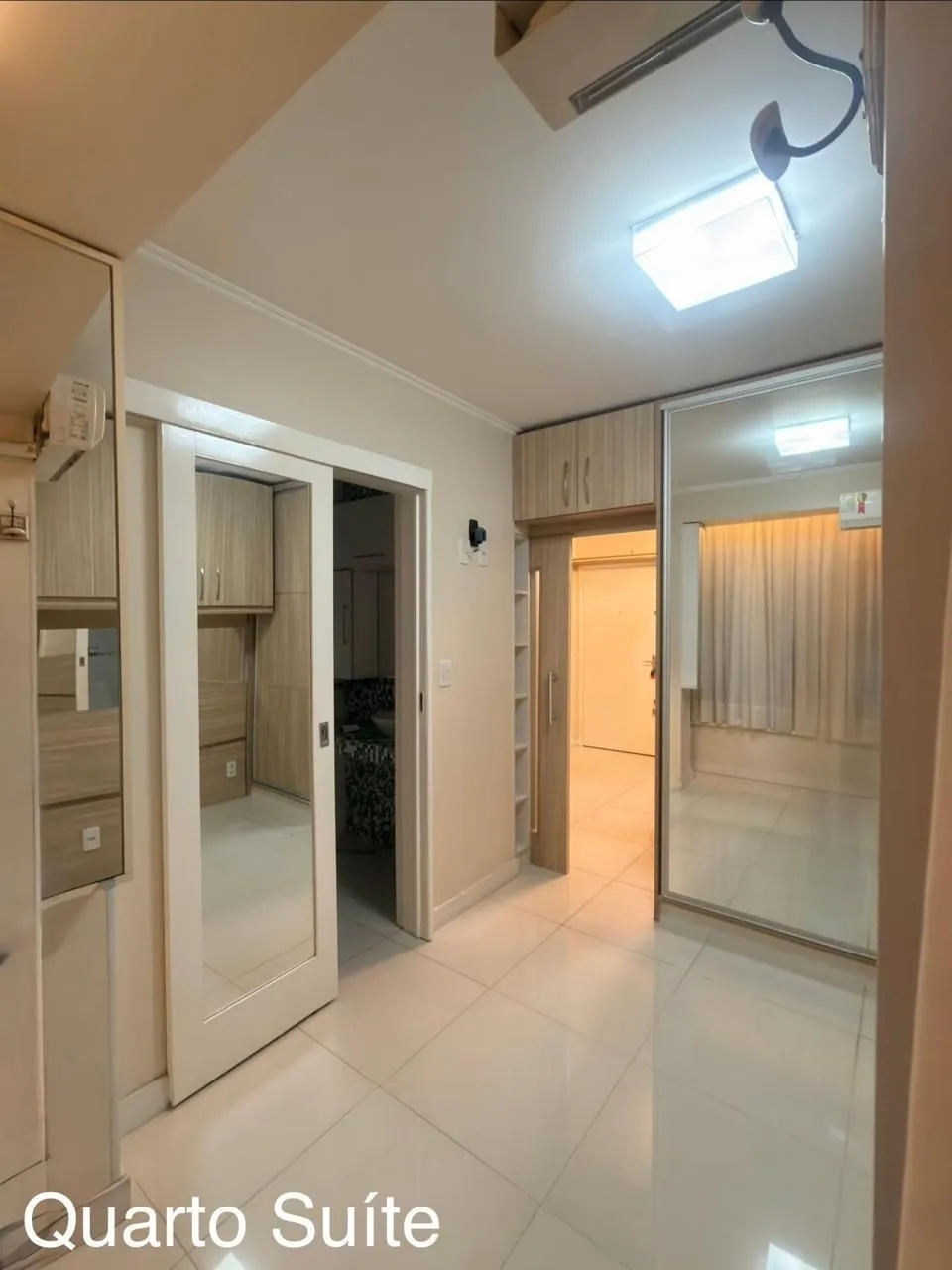 Imagem Apartamento de 2 quartos, suíte e 1 vaga de garagem no bairro Menino Deus em POA