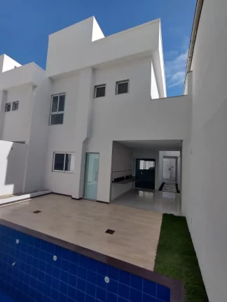 Imagem Casa a venda na praia do Morro Guarapari-ES Casa duplex composta por 3 suítes sendo uma Suite master com Closet e 2 vagas de garagem