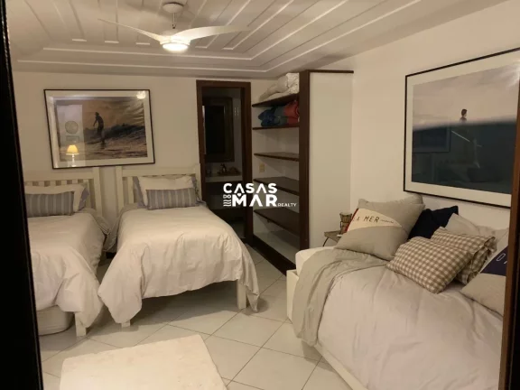 Imagem Casa de Luxo à Beira-Mar em Búzios, Condomínio Camurupim na Praia Rasa: 6 Quartos, 6 Suítes, 4 Salas - Segurança e Conforto!