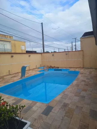 Foto do imóvel Sobrado com 2 dormitórios à venda, 79 m² por R$ 318.000 - Oceanópolis - Mongaguá/SP