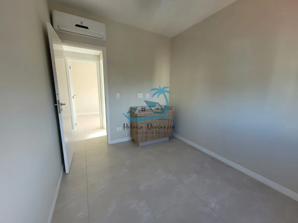 Imagem Excelente Apartamento com 3 dormitórios semi mobiliado e vista para o mar, a venda a 250 metros da orla de Itagua em Ubatuba.