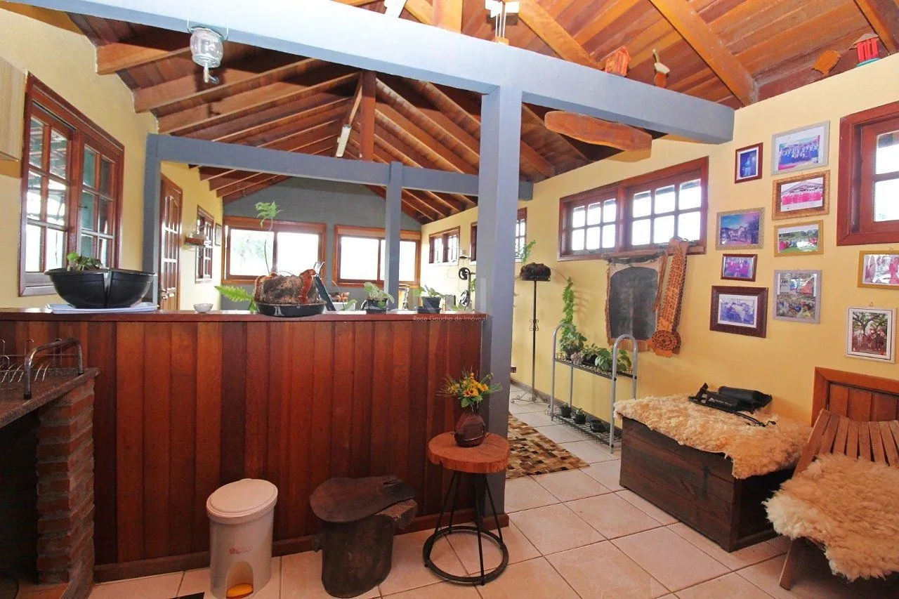 Imagem Casa para Venda - 339m², 3 dormitórios, 2 vagas - Vila Nova, Porto Alegre