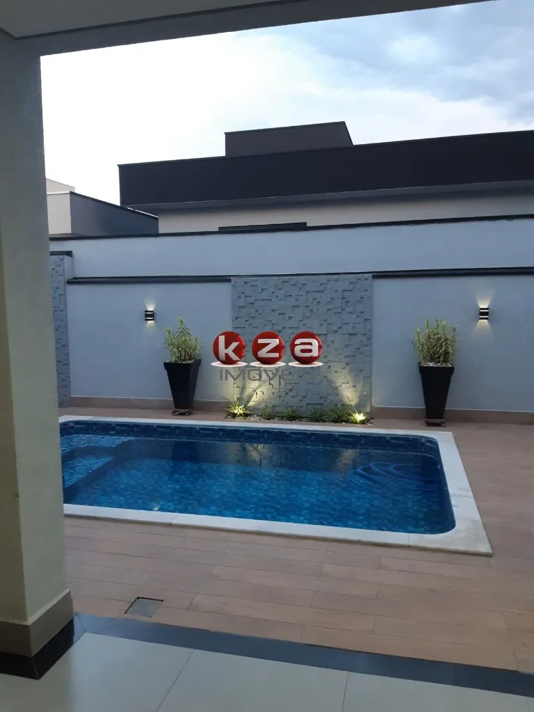 Imagem Casa de alto padrão em condomínio: 3 quartos, 3 suítes, 2 salas, 5 banheiros, 4 vagas, 200m² - Residencial Real Parque, Sumaré-SP.
