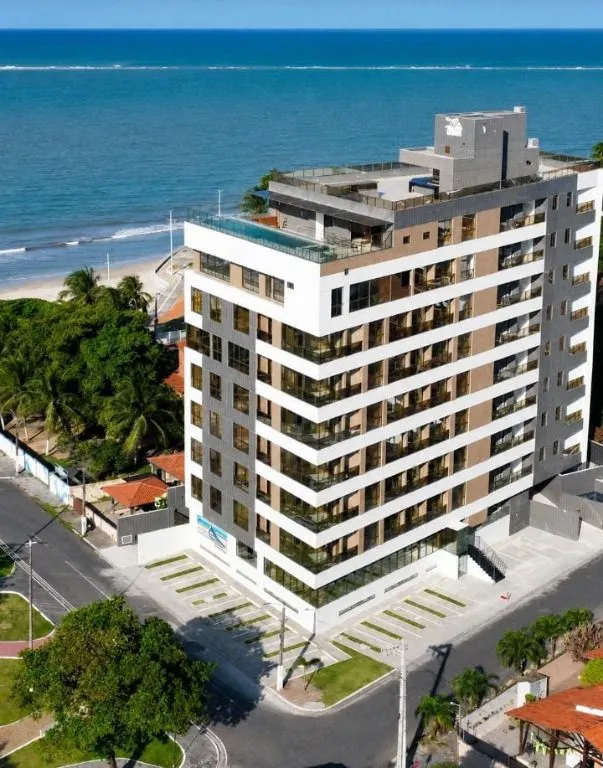 Foto do imóvel Flat pé na areia em Ponta de Campina, mobiliado, andar alto, vista para o mar, piscina panorâmica e lazer completo.