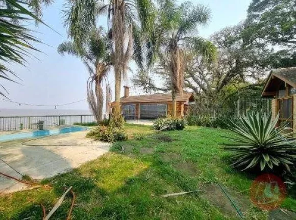 Imagem Casa com 3 dormitórios para alugar, 500 m² por R$ 19.884,00/mês - Pedra Redonda - Porto Alegre/RS