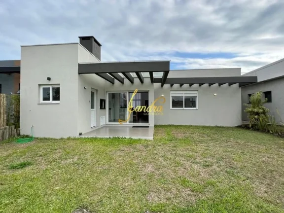 Imagem Excelente Casa no Condomínio Riviera Estilo contemporânea! Composta por 4 suítes, sendo 2 americanas,