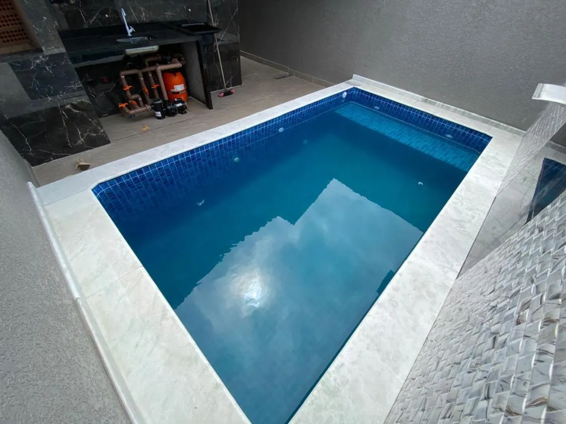 Imagem LINDA CASA NOVA COM PISCINA NO VERDE MAR
