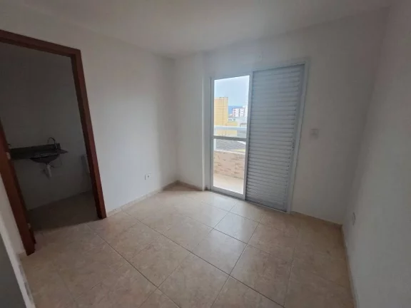 Imagem Apartamento com 2 dormitórios à venda, 56 m² por R$ 320.000 - Caiçara - Praia Grande/SP