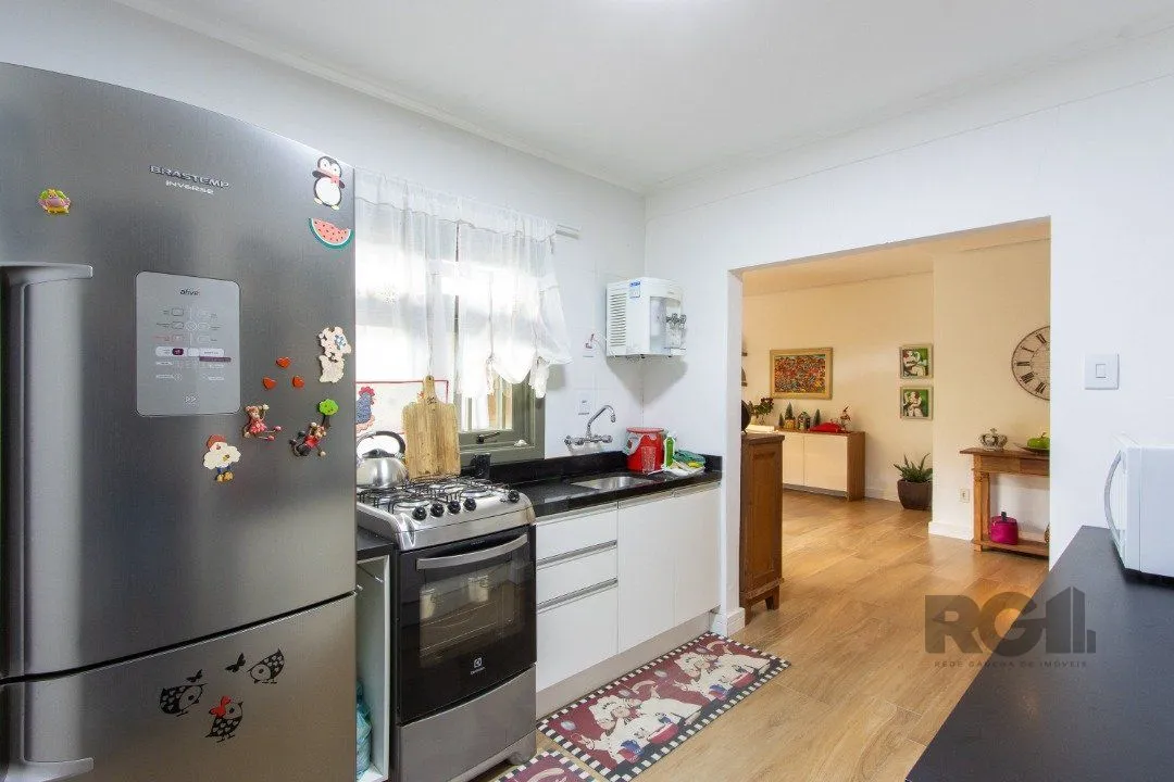 Imagem Casa térrea, 3 quartos, edícula, com 2 suites, pátio - Bairro Guarujá