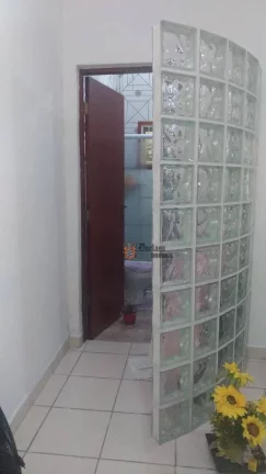 Imagem Sobrado com 3 dormitórios à venda, 180 m² por R$ 450.000 - Morro do Algodão - Caraguatatuba/SP