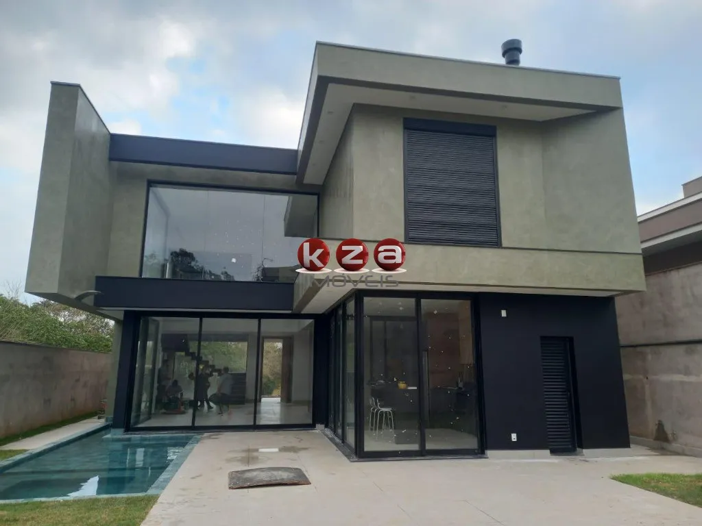 Imagem Maravilhoso sobrado a venda em Valinhos-SP, Reserva do Itamaracá: 3 suítes, 3 salas, elevador, piscina e 4 vagas de garagem, 330m².