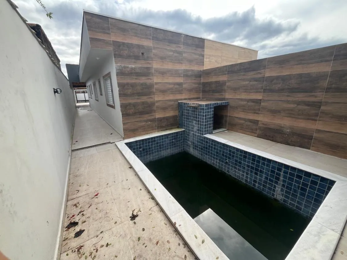 Foto do imóvel CASA NOVA 3 DORM COM PISCINA LADO PRAIA NO BOPIRANGA EM ITANHAEM