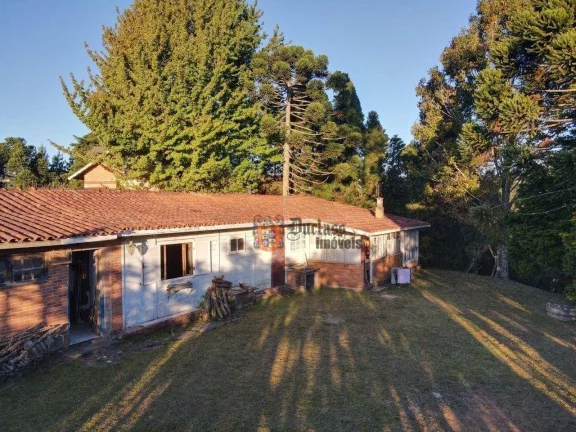 Imagem Casa com 3 dormitórios à venda, 280 m² por R$ 1.220.000 - Alto Do Capivari - Campos do Jordão/SP