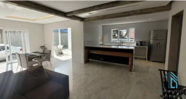 Imagem Sobrado moderno, com amplo terreno, 03 quartos c/suíte, área gourmet, em Campo Largo PR