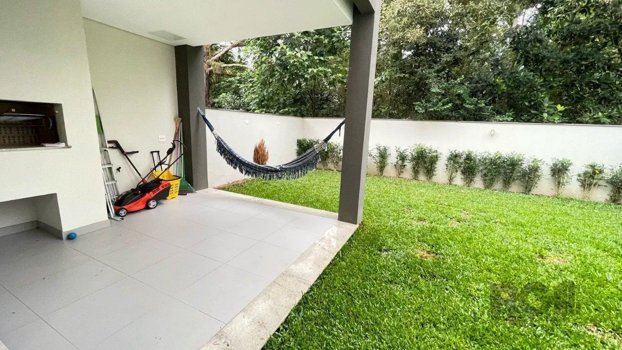 Imagem Casa em condomínio com 3 suítes, no bairro Pedra Redonda, Porto Alegre/RS