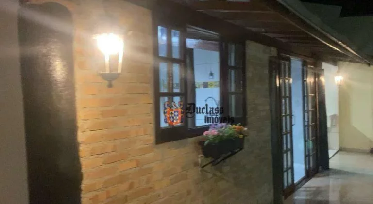 Imagem Casa com 3 dormitórios à venda, 158 m² por R$ 950.000 - Martim de Sá - Caraguatatuba/SP