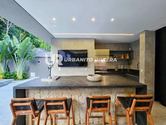 Imagem Casa no Módulo 11 da Riviera com 6 suítes, piscina, jacuzzi e praça de fogo integrada à natureza