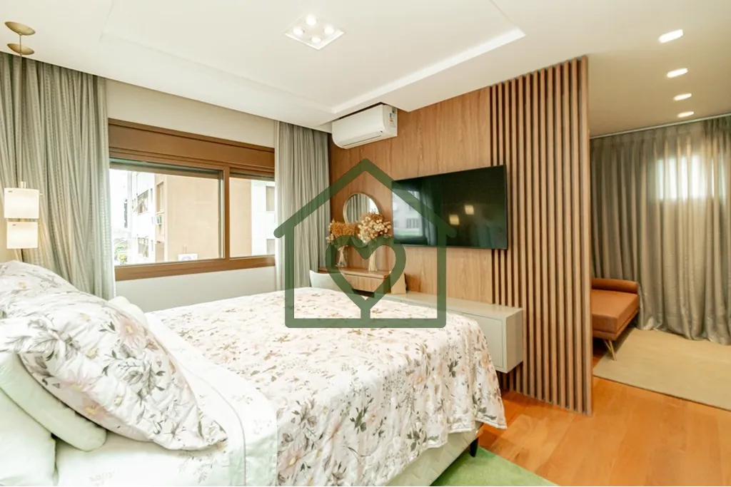 Imagem Você está prestes a descobrir um verdadeiro achado no coração de Menino Deus. Este apartamento d...