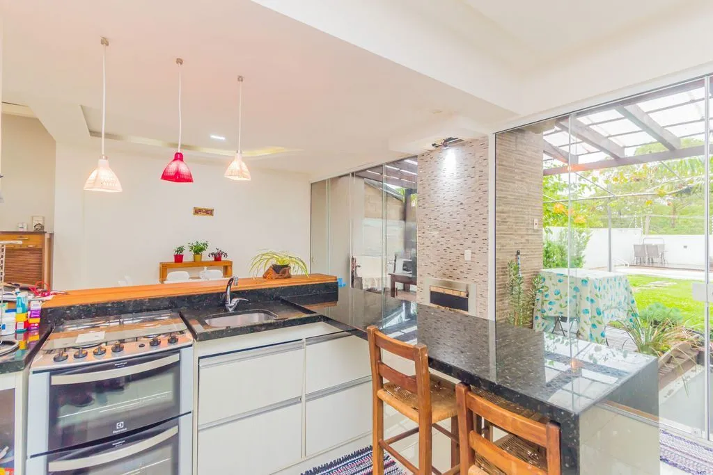 Imagem Casa em Condomínio 3 dorms à venda Avenida Juca Batista, Hípica - Porto Alegre