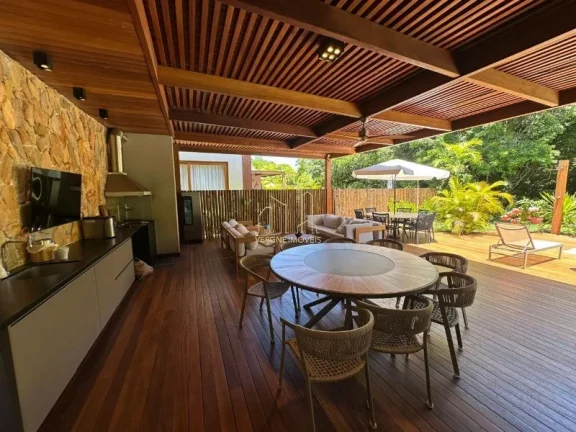 Imagem Com ambientes amplos e moderno essa casa decorada com quatro suítes e área gourmet a venda na Praia do Forte