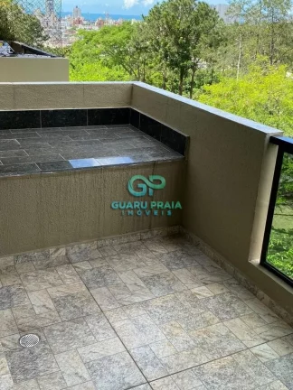 Imagem 3 dormitórios, 1 suíte com closet, pequena vista para o mar, sala para dois ambientes, varanda com vista para área verde, cozinha americana
