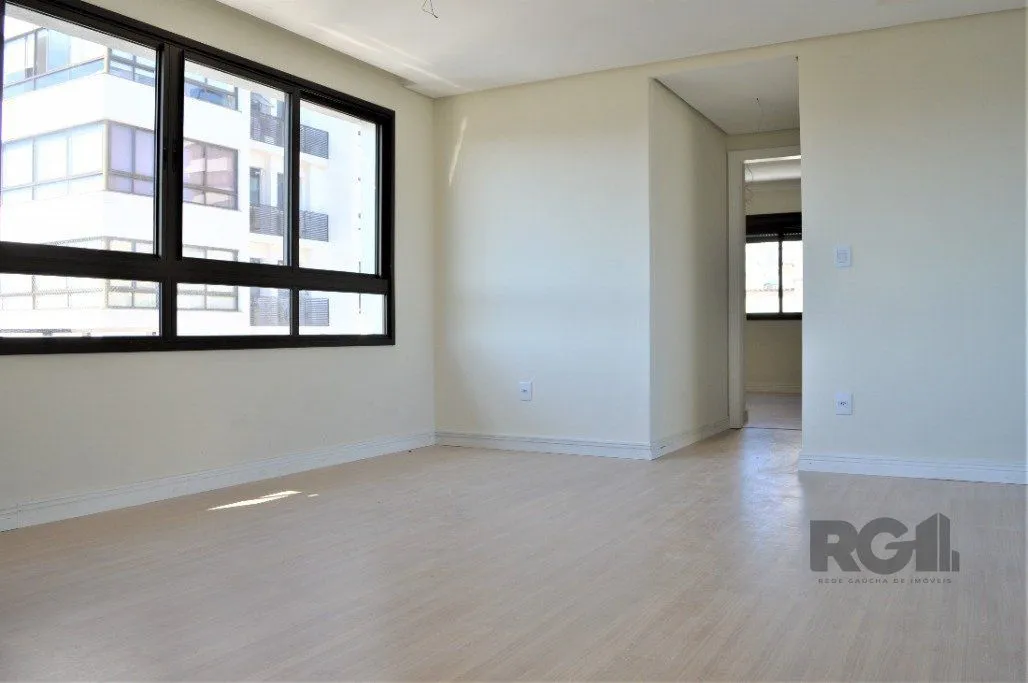 Imagem Lindo apartamento 2 dormitórios com 2 suítes, lavabo, vaga de garagem, amplo living 2 ambientes e cozinha com churrasqueira.