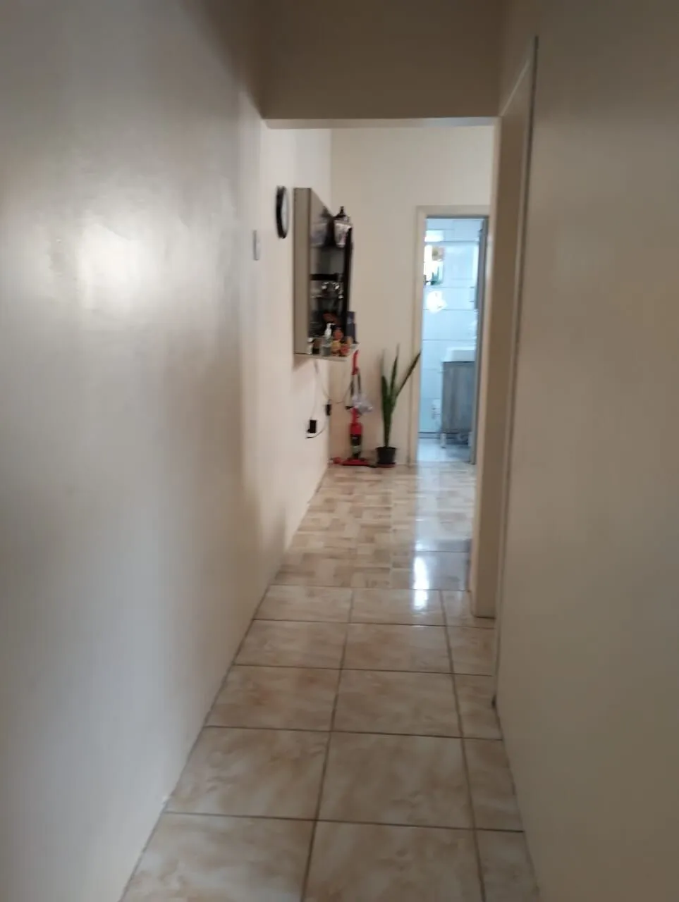 Imagem Terreno com duas frentes, três casas (duas c/dois dormitórios e a outra tipo tipo JK)