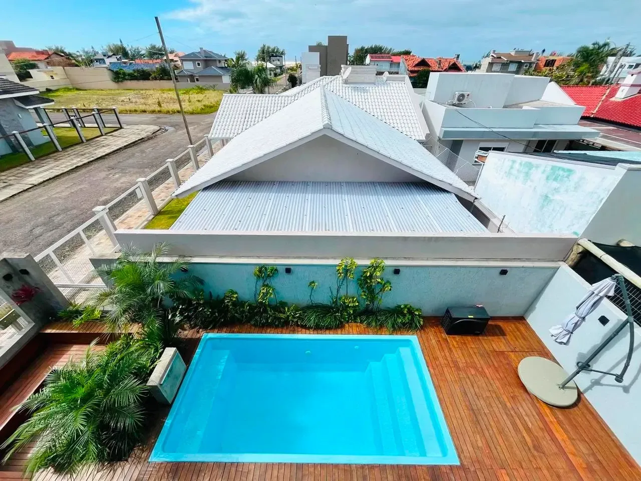 Imagem Sobrado com 4 Quartos à Venda, 290 m² em Village  - Capão da Canoa