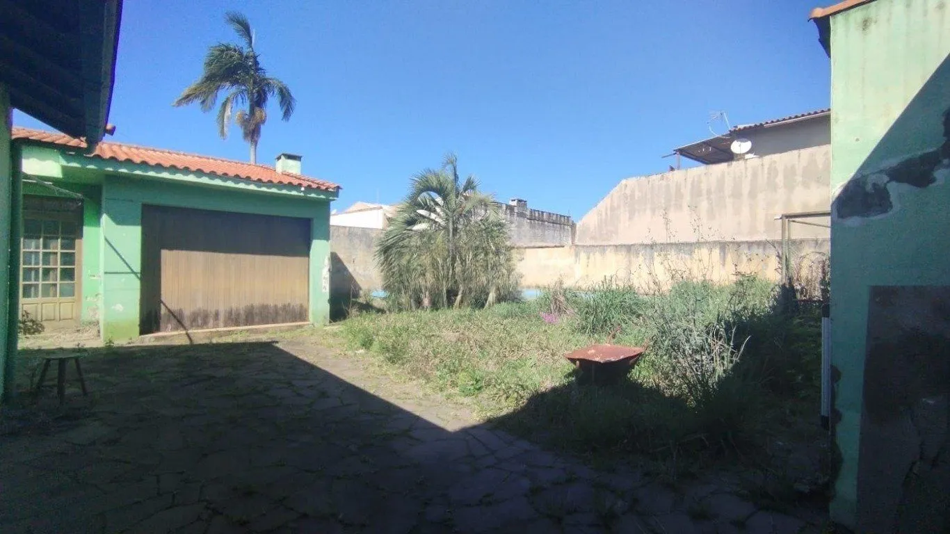 Imagem Casa com 4 quartos e 257m² à venda em Guarujá, Porto Alegre.