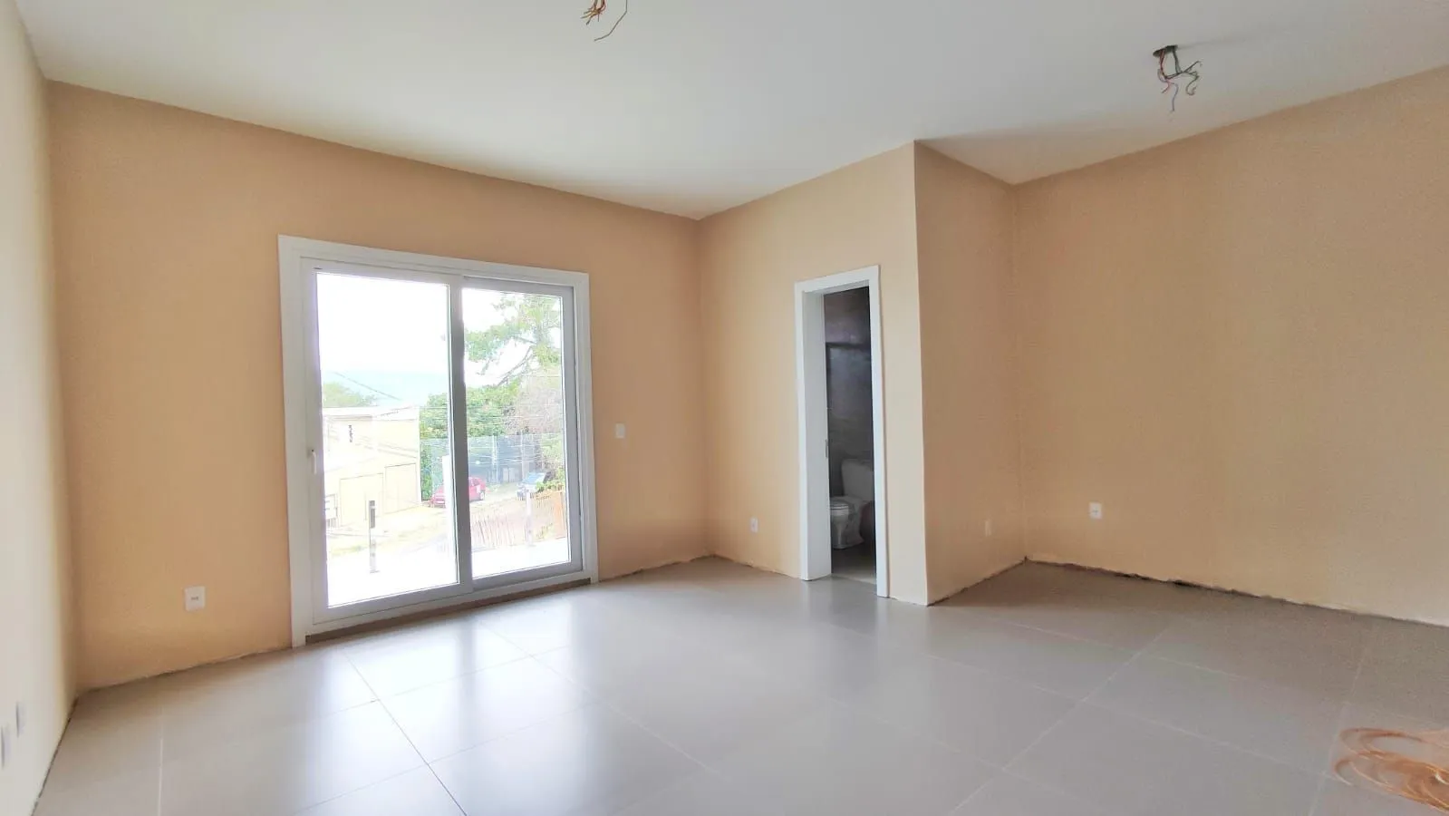 Imagem Sobrado 3 dormitórios suíte à venda no Vila Ipiranga - Porto Alegre - R$ 720.000