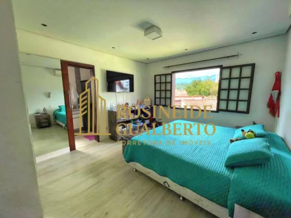 Imagem CASA COM 3 SUÍTES NO CENTRO E CARAGUATATUBA A 100 METROS DA PRAIA