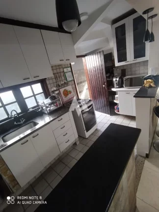 Imagem Sobrado Geminado com 02 dormitorios sendo 02 suites no Boqueião em Santos