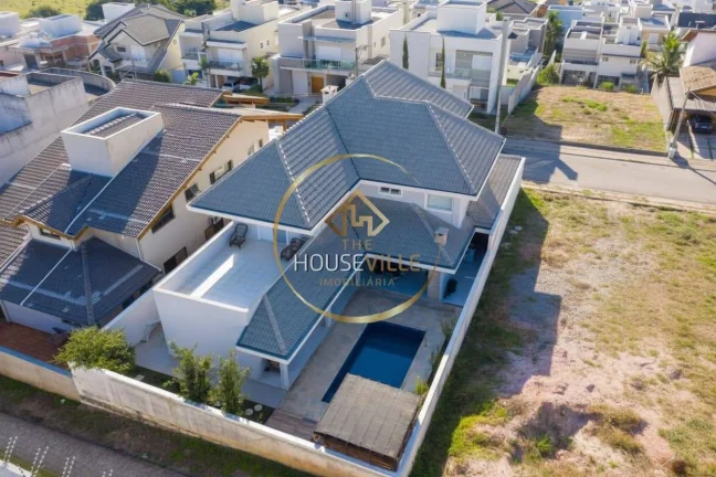 Imagem Casa Sobrado, 4 Dormitórios (4 suítes), Condomínio Jaguary, Urbanova.