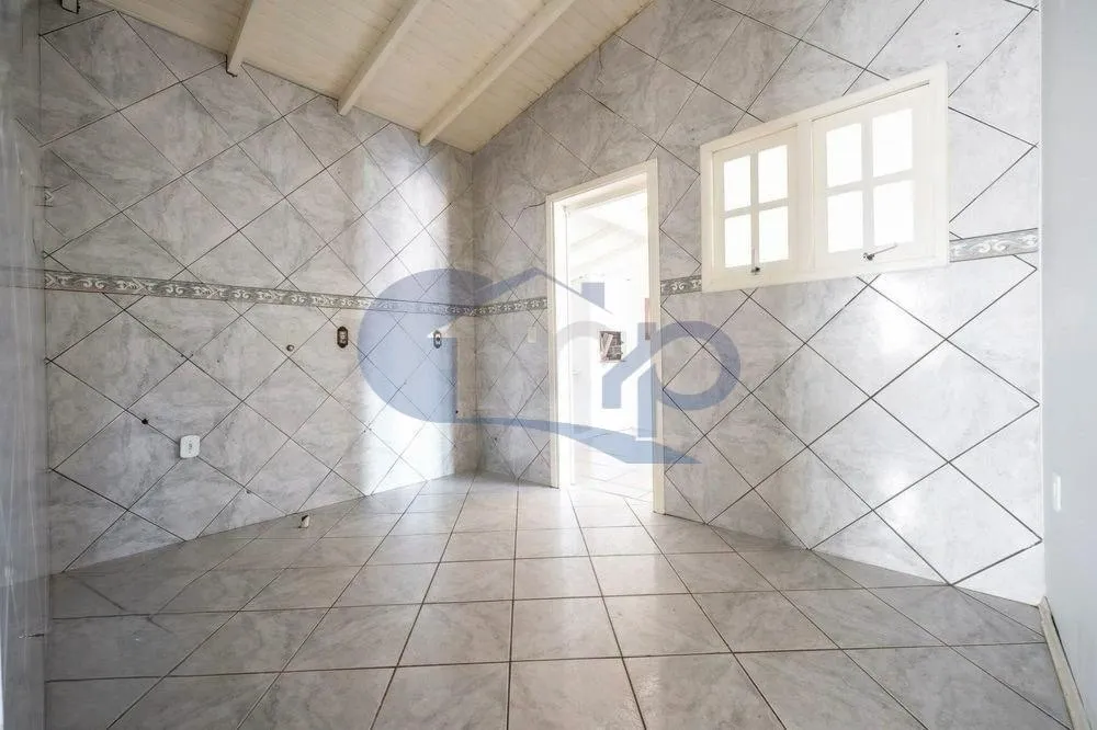 Imagem Casa a venda com 3 dormitorios na Vila Sao Joao em Torres/RS