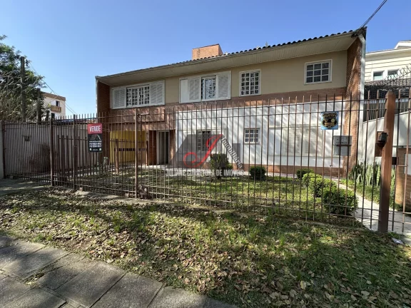 Imagem Casa de Alvenaria Residencial e Comercial à venda no bairro Vila Izabel em Curitiba.