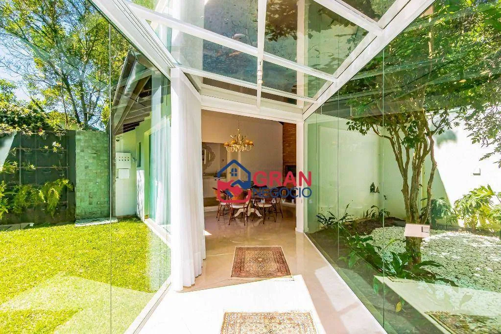 Imagem Casa em condomínio à venda, 4 suítes e 7 vagas