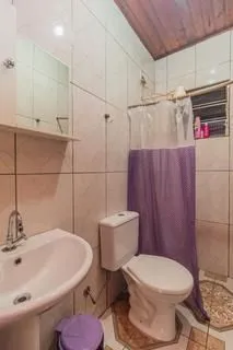 Imagem Casa 2 dorms à venda Avenida Outeiro, Coronel Aparício Borges - Porto Alegre